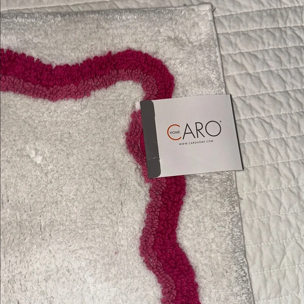 Caro Home pink and white bath rug 21x 34 new